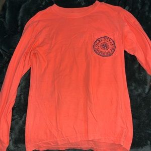 Surf style long sleeve t-shirt size Small. Really pretty orange.